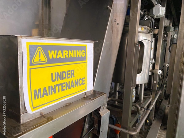Fototapeta Warning Sign on a Machine Under Maintenance