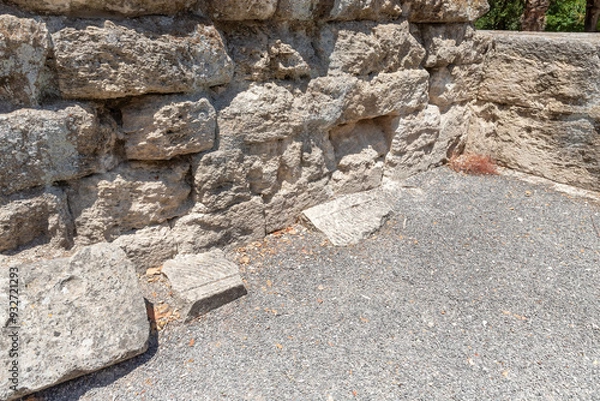 Fototapeta Fragments  of stone burial slabs in the ancient burial site of Beit Shearim Necropolis near Kiryat Tivon city in northern Israel