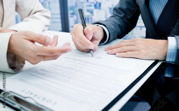 Obraz Business man signing a contract