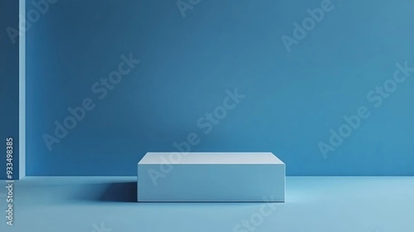 Fototapeta A blue wall with a white box on it