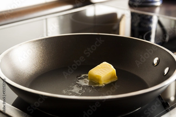 Obraz iron pan with butter