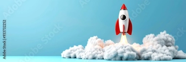 Fototapeta A red and white toy rocket launching into the sky with smoke beneath it, depicted against a blue background.