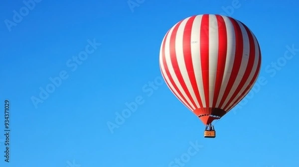 Fototapeta A red and white hot air balloon flying in the sky, AI