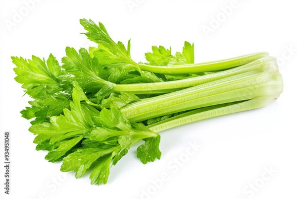 Fototapeta A bunch of celery is sitting on a white background. The celery is fresh and green, and it looks like it's ready to be eaten