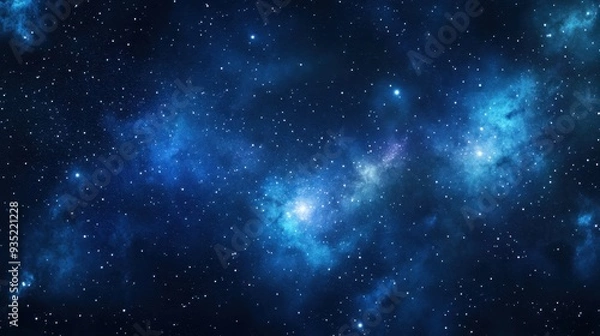 Fototapeta A stunning cosmic scene showcasing stars and nebulae in a deep blue space background.