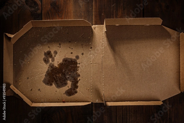 Obraz remnants of pizza in delivery box with pizza time text