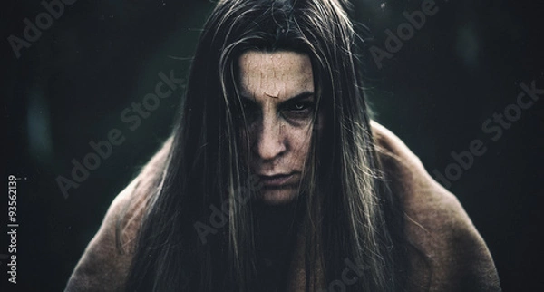 Obraz Dark halloween portrait of a girl with cracked skin and black eyes. Photo has added grain and other effects to look more realistic.
