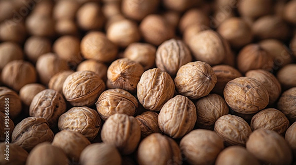 Fototapeta walnuts revealing their textured surface, symbolizing complexity and hidden potential within