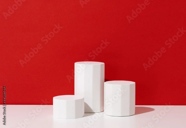 Obraz Christmas theme product presentation background made with three pedestals on red.