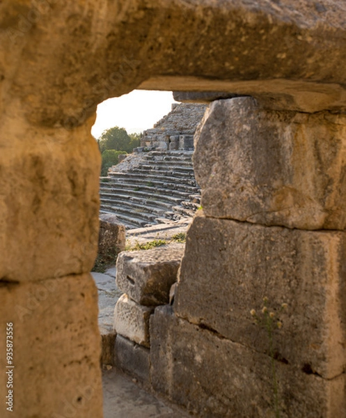 Fototapeta Ruins, entrance and outdoor for architecture history, abstract and public destination for tourism, Location, ancient exterior and culture exploration or sightseeing, travel and structure in Turkey