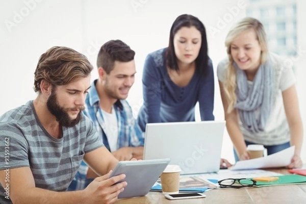 Fototapeta Business people using technology 