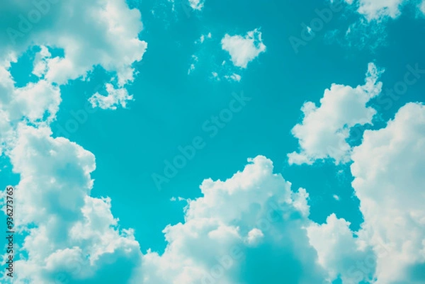 Fototapeta Blue sky background with tiny clouds. Abstract nature background. Copy space.