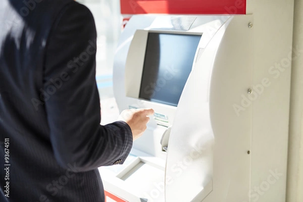 Obraz ATMを使うサラリーマン 