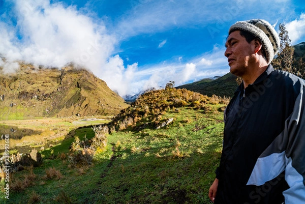 Obraz portrait of an elderly Andean man, with a depressed look in the background of the Andes mountains