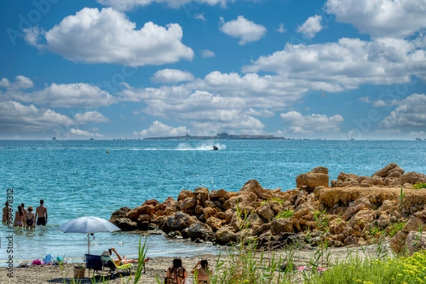 Fototapeta VARADERO BEACH, SANTA POLA, SPAIN. VIEW OF A WATERCRAFT AT FULL SPEED