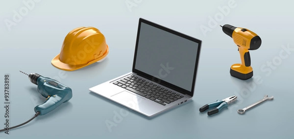 Obraz laptop, helmet, drill and construction tools on an isolated back