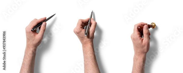 Fototapeta Three hands are shown holding a different writing instrument each, including a fountain pen, a ballpoint pen, and a wax seal stamp, inviting creativity and communication