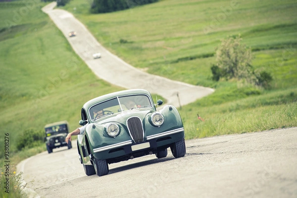 Obraz Auto classica su strada a zig-zag