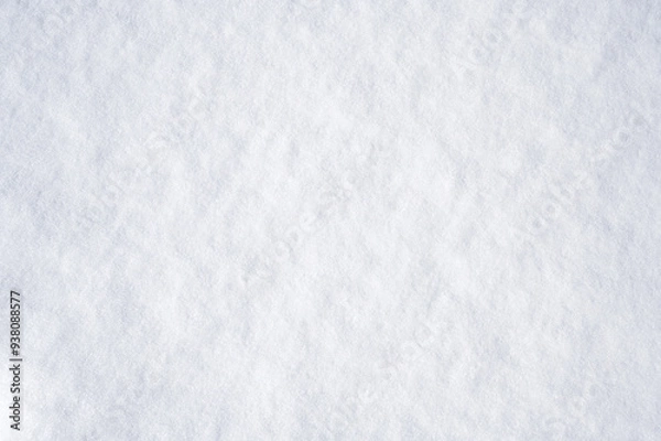 Fototapeta The texture of the snow. Winter white background. view from above
