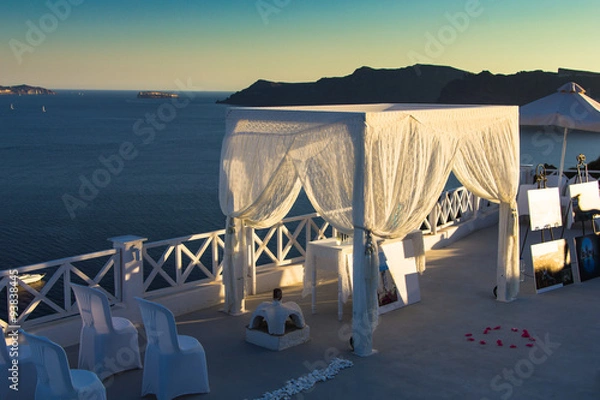 Fototapeta The wedding spot in Santorini caldera