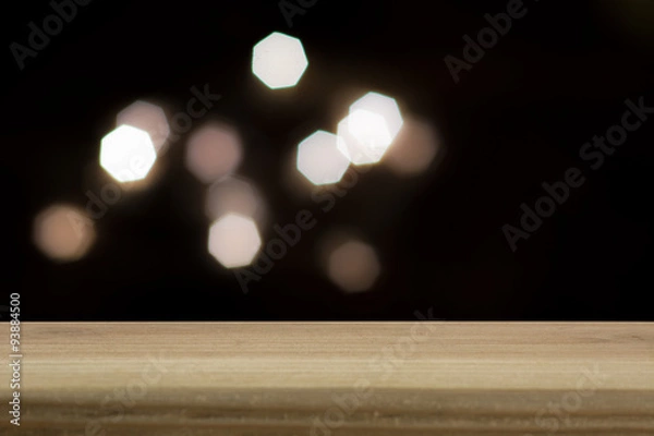 Obraz Romantic background with empty wooden deck table over festive bo