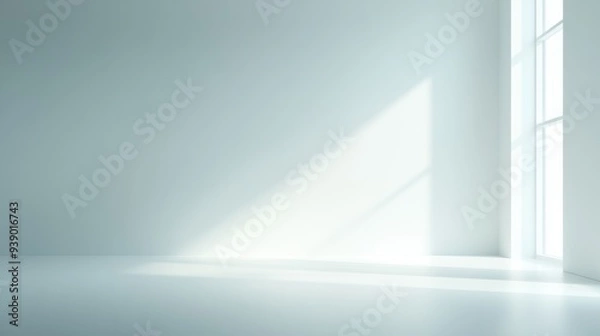 Fototapeta A large, empty room with a window in the corner