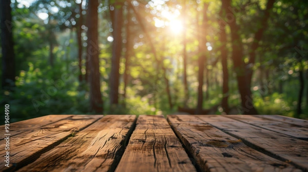 Fototapeta Rustic wooden table stands still in the heart of a lush forest, bathed in soft sunlight. Advertisement , product display, brand 