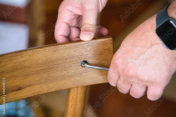 Obraz Handyman assembling chair