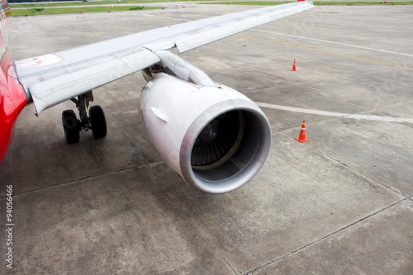 Fototapeta wing and engine a part of the plane