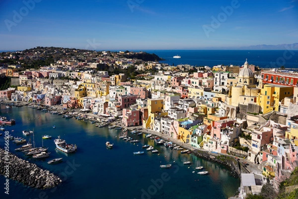 Obraz Beautiful panoramic view of Procida, Italian Capital of Culture 2022. Harbour of Corricella, Campania region, Italy, Europe with colorful houses, cafes and restaurants, fishing boats and yachts.