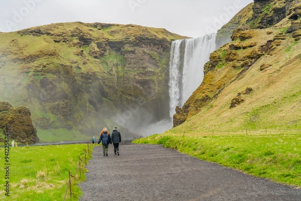 Obraz Famous Skogafoss Waterfall in south Iceland with a back view of a couple