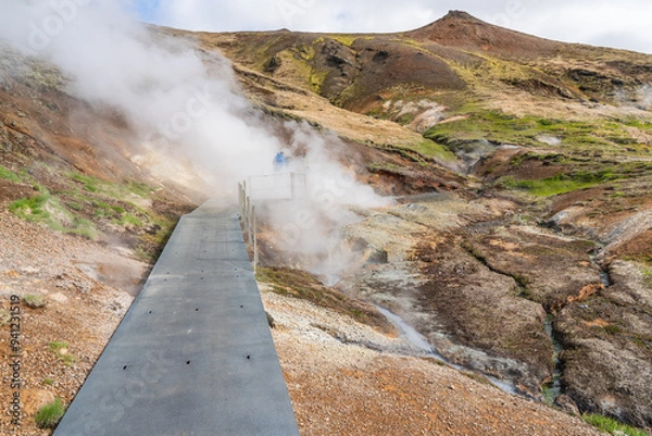 Obraz The Hveradalir Geothermal Area in Iceland on a sunny spring day with clouds and blue sky