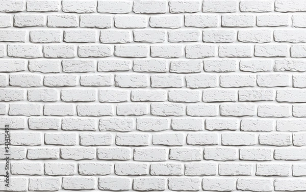 Fototapeta A clean, white-painted brick wall providing a bright and modern background, perfect for various design and architectural projects.