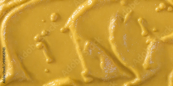 Fototapeta Yellow mustard sauce or paint, delicious yellow creme, smooth and wavy. Food background, texture, wallpaper or banner.