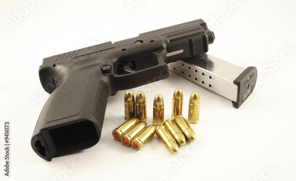 Fototapeta pistol and bullets
