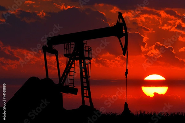 Fototapeta Pompa olejowa na czerwonym zachodzie