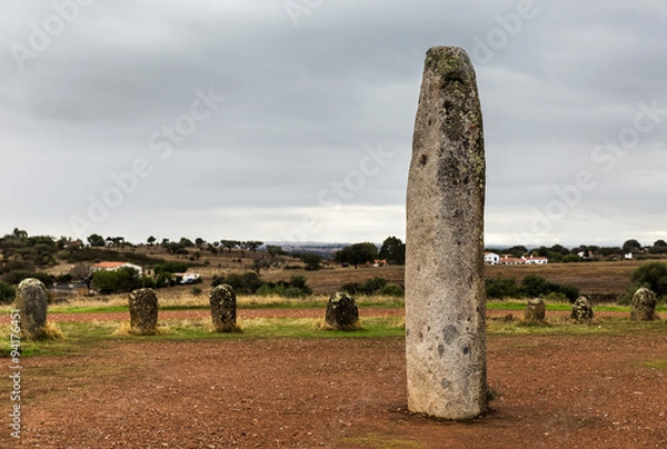 Obraz The cromlech of Xerez is an extraordinary megalithic monument. It must have been built between the early fourth millennium or mid-third millennium BC. Located near Monsaraz in Portugal.