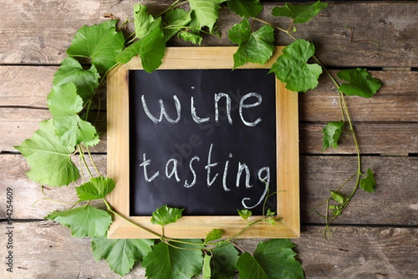 Obraz Old square chalk scripted frame with vine on wooden background