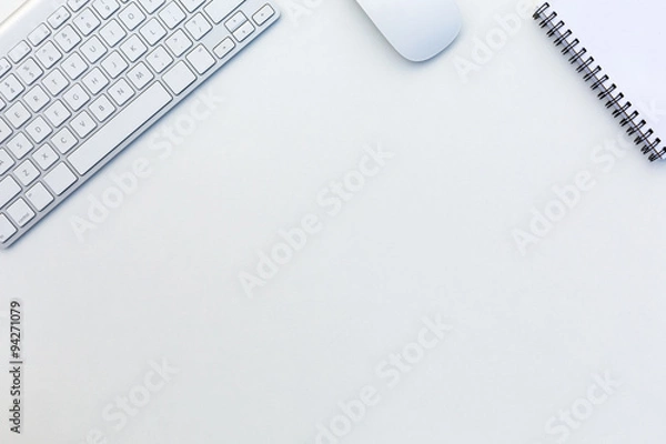 Fototapeta Office White Table with Computer Keyboard Mouse and Notepad Top View