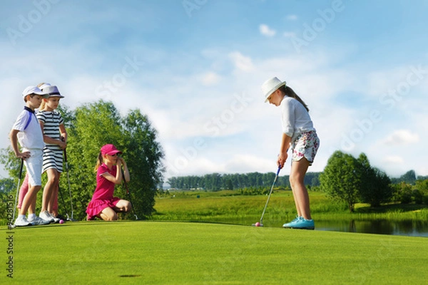 Fototapeta Kids playing golf