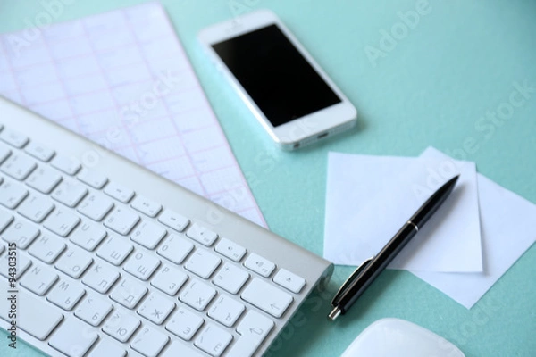 Fototapeta Medical still life with keyboard on blue table