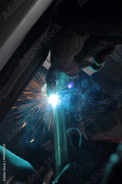 Fototapeta The master behind work. Welding