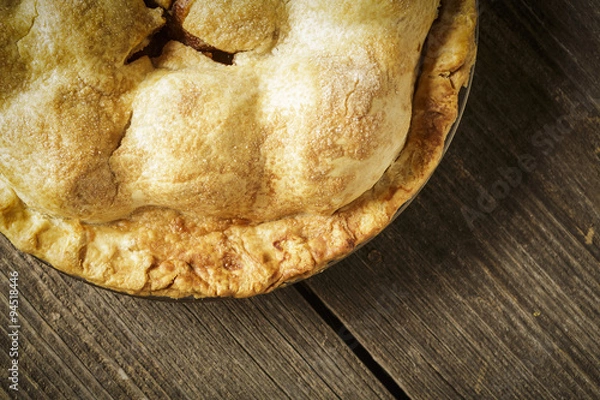 Obraz Golden Apple Pie on Rustic Barnwood