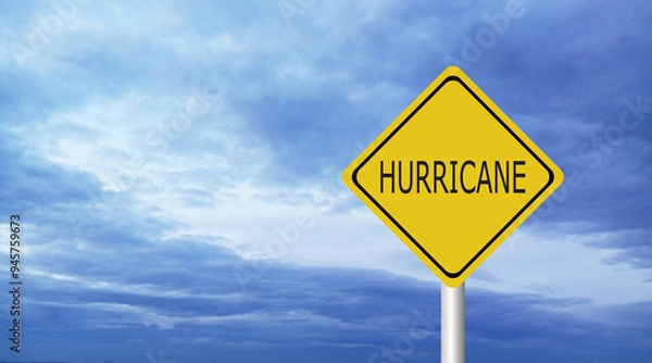 Fototapeta danger,caution,Hurricane Idalia warning sign against a powerful stormy background with copy space. Dirty and angled sign with cyclonic winds add to the drama.hurricane season sign on cloudy background