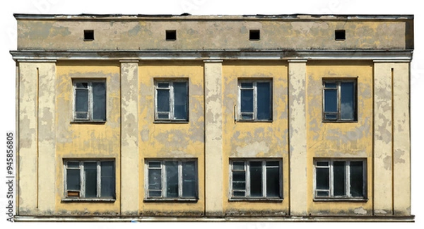 Fototapeta Destroyed wall of an old house with broken dirty windows isolated