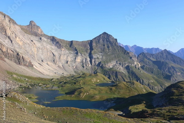 Fototapeta Turquoise mountain lake Barroude in French Pyrenees on HRP long-distance hiking trail