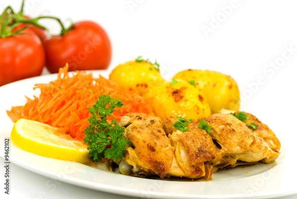Fototapeta Hähnchen-Keule-knusprig gebraten mit Bratkartoffeln