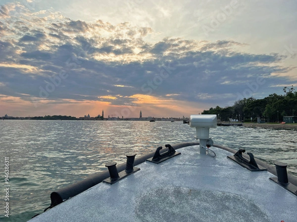Fototapeta A view of Venice from a boat on the sunset