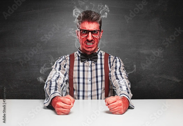 Obraz Angry genius furious on blackboard background