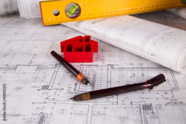 Obraz Buildings under construction and cranes

